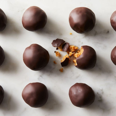 Chocolate Covered Peanut Butter Balls by Buddha Belly Baking